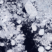 Drastic reductions in Arctic sea ice in the last decade may be intensifying the chemical release of bromine into the atmosphere, resulting in ground-level ozone depletion and the deposit of toxic mercury in the Arctic. (Credit: NASA) Click for high resolution version of the image