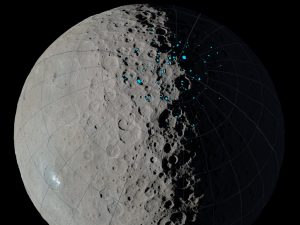At the poles of Ceres, scientists have found craters that are permanently in shadow (indicated by blue markings). Such craters are called "cold traps" if they remain below about minus 240 degrees Fahrenheit (minus 151 degrees Celsius). These shadowed craters may have been collecting ice for billions of years because they are so cold. Credit: NASA/JPL-Caltech/UCLA/MPS/DLR/IDA. 