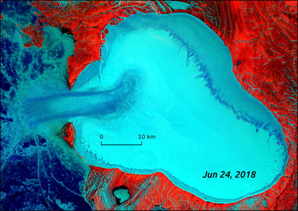 Landsat 8 false-color composite of Vavilov Ice Cap on June 24, 2018. Authors of a new study suspect the images show the first observation of a transition from a glacial surge to a longer-lasting flow called an ice stream. AGU/Geophysical Research Letters/Whyjay Zheng.