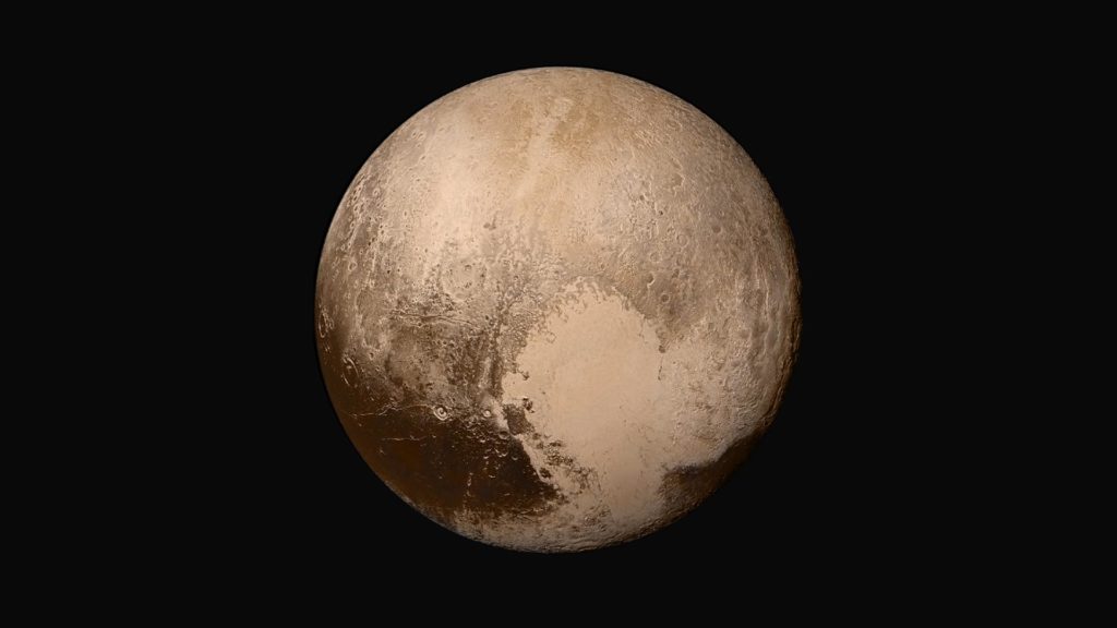 Four images from NASA's New Horizons' Long Range Reconnaissance Imager (LORRI) were combined with color data from the Ralph instrument to create this global view of Pluto. Credit: NASA/Johns Hopkins University Applied Physics Laboratory/Southwest Research Institute. 