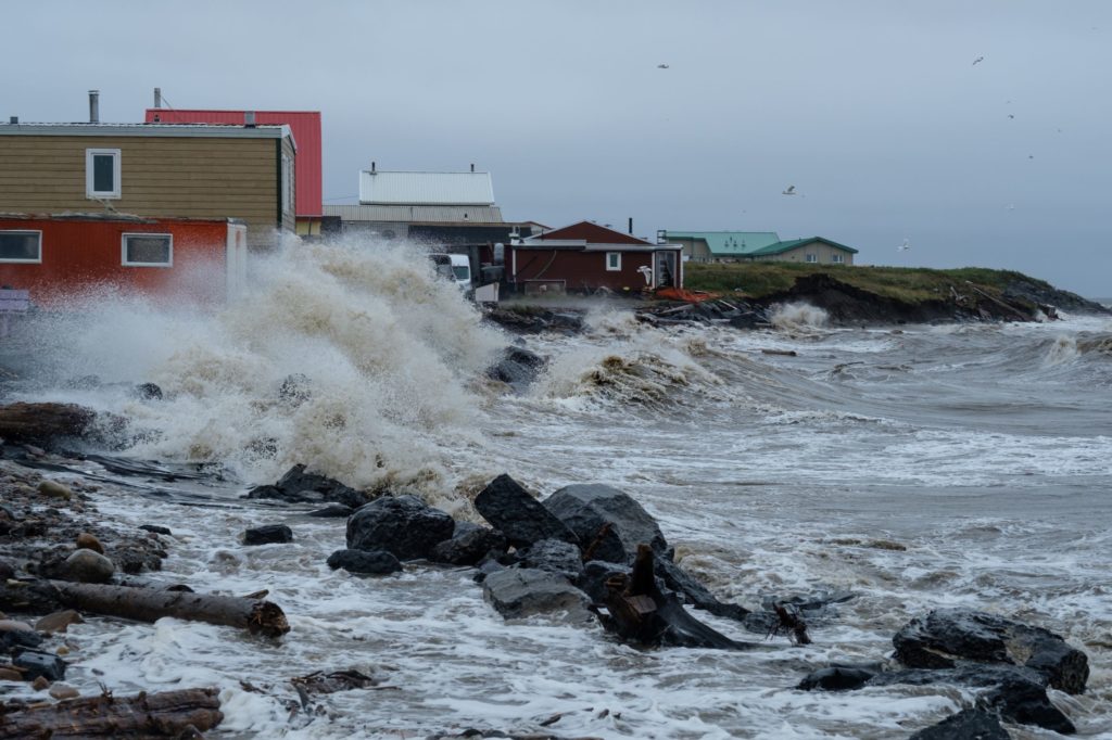 A wave washing up on the Inuvialuit hamlet of Tuktoyaktuk in Canada’s Northwest Territories during an August 2019 storm. Credit: Weronika Murray.