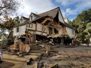 Damage from a major post-wildfire landslide that occurred on 9 January 2018 near Montecito, Santa Barbara County as a result of the 2017 Thomas Fire. Credit: USGS/Jason Kean. 
