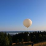 A weather balloon lifts off carrying ozone measuring instruments.