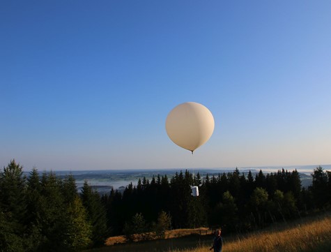 A weather balloon lifts off carrying ozone measuring instruments.
