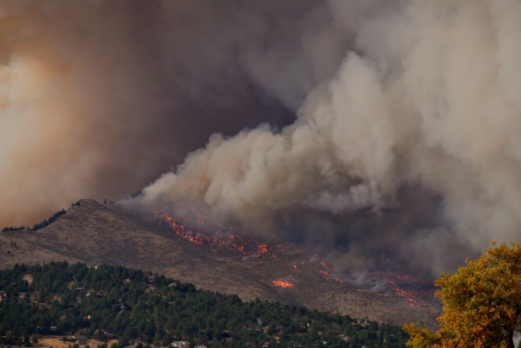Smoke rises from Calwood Fire as it nears a neighborhood in Boulder County on October 17, 2020. Credit: Malachi Brooks 