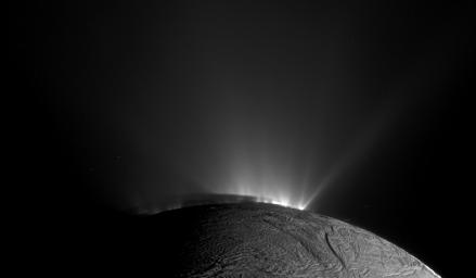 Image captured by Cassini spacecraft of Water vapor geysers shoot from cracks in the icy surface of Saturn’s moon Enceladus.