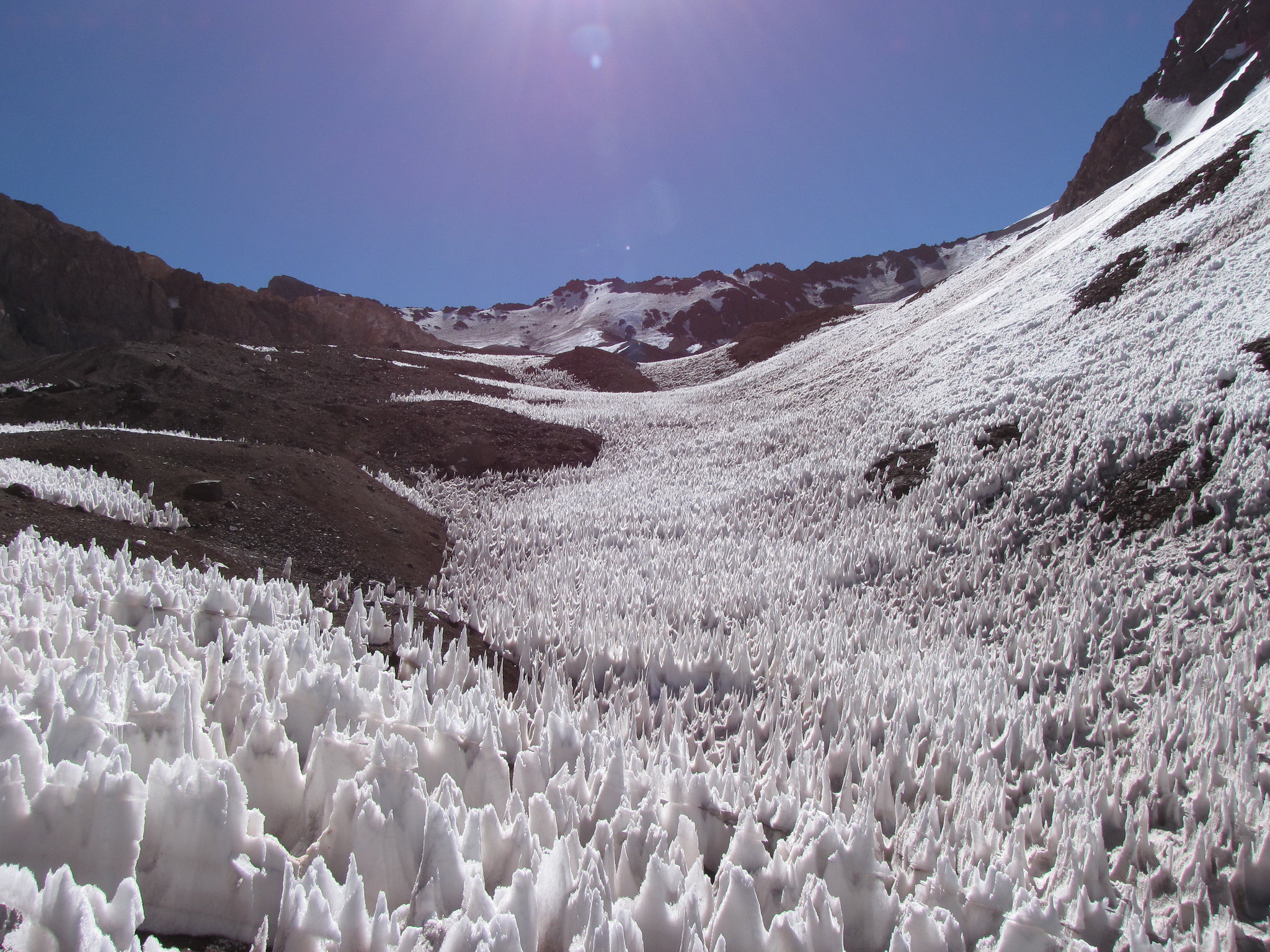 Penitentes, spiked ice structures, on a mountain. 