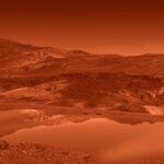 An artist’s rendition of Titan’s landscape, showing orange hills and reflective, smooth lake.