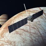 illustration of the Europa Clipper spacecraft passing over Jupiter's moon Europa with Jupiter in the background