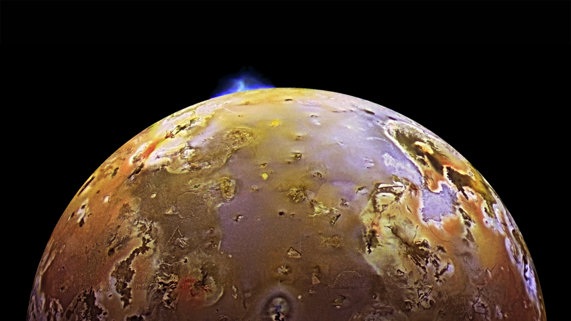 a glowing volcanic eruption on the surface of Io, a moon of Jupiter, as seen from space, with the eruption positioned on Io's horizon against the backdrop of space